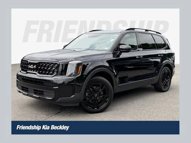 Used 2024 Black Kia EX X-Line image 1
