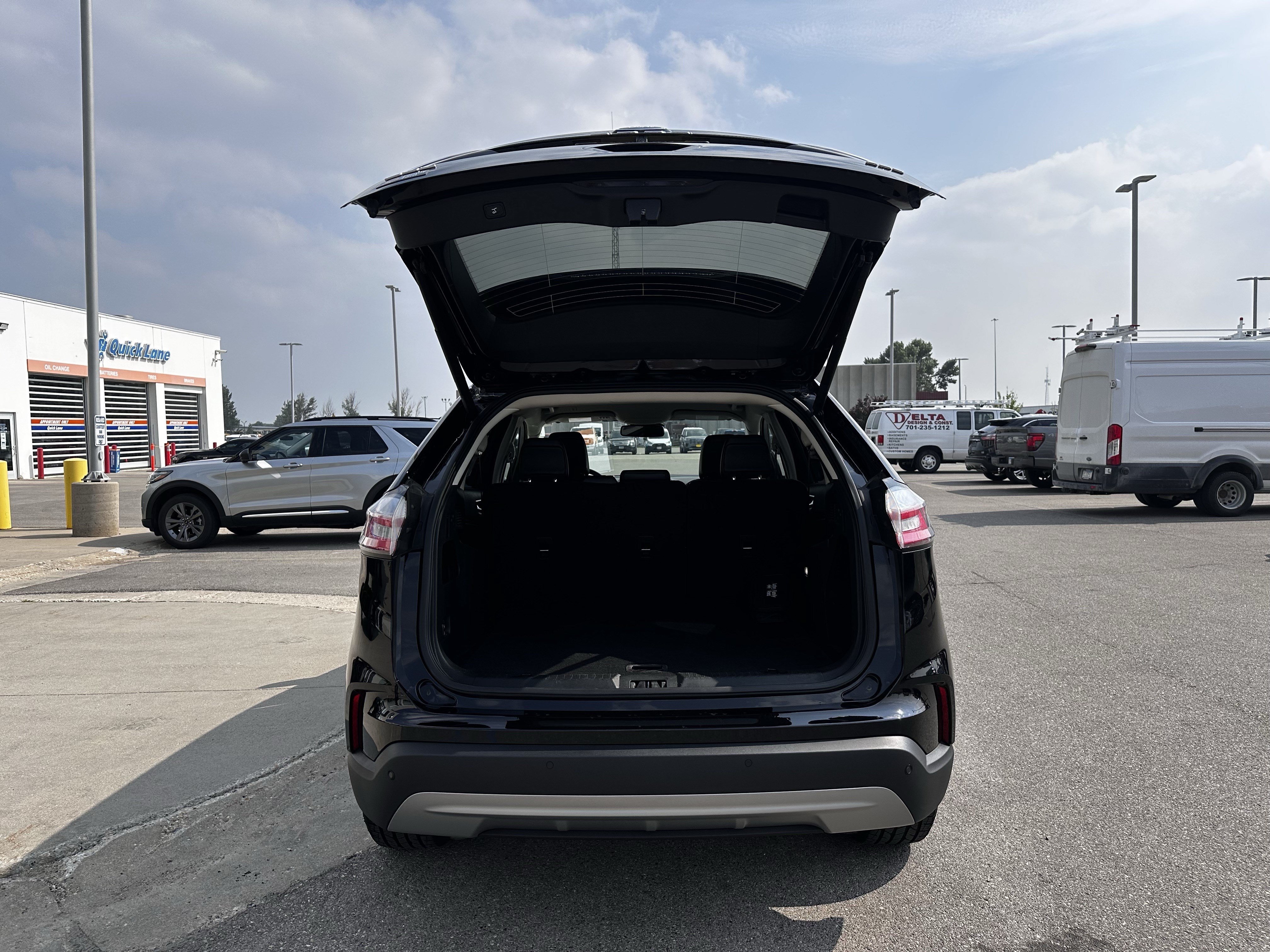 Used 2024 Agate Black Metallic Ford SEL image 22