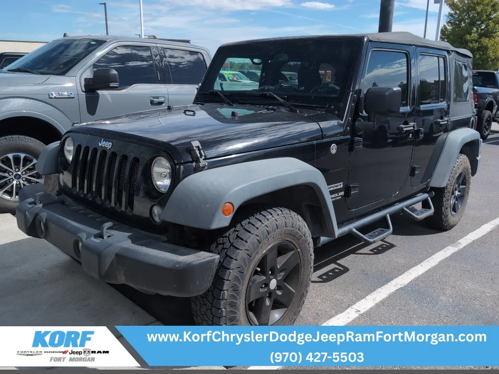 Used 2016 Black Clearcoat Jeep Sport image 1
