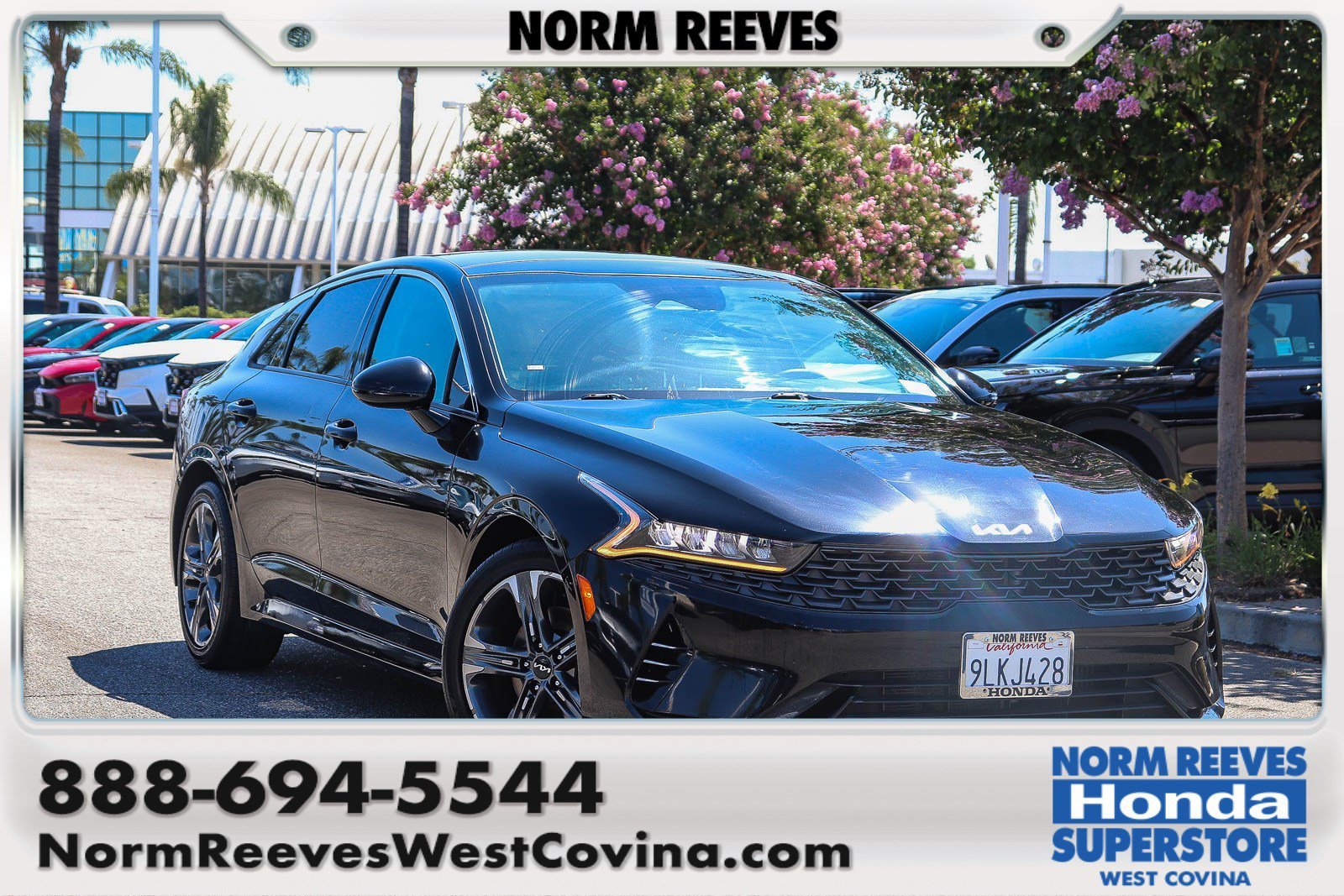 Used 2022 Ebony Black Kia EX image 1
