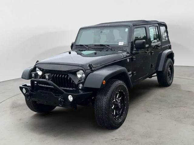 Used 2015 Black Jeep Unlimited Sport image 1