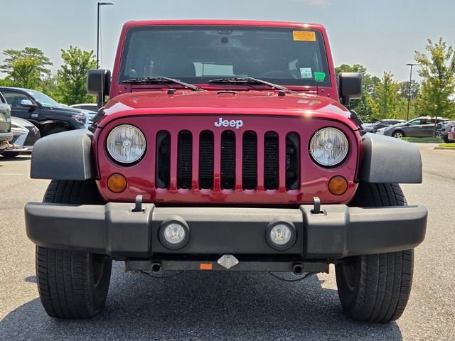 Used 2013 Red Jeep Unlimited Sport image 8