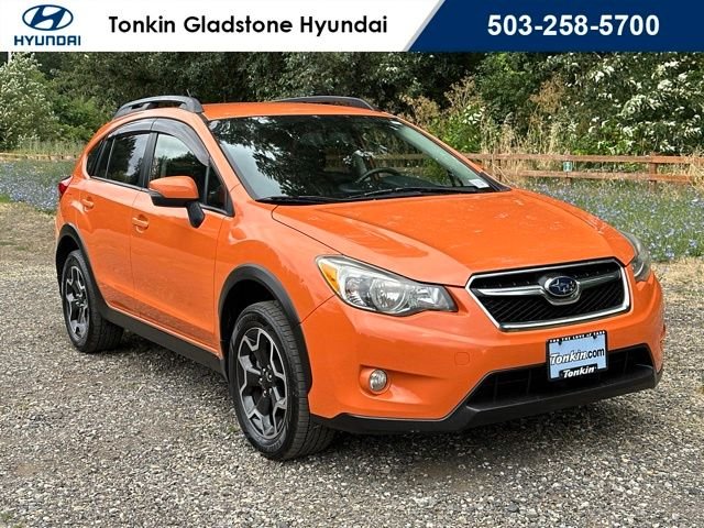 Used 2015 Tangerine Orange Pearl Subaru 2.0i Limited image 1