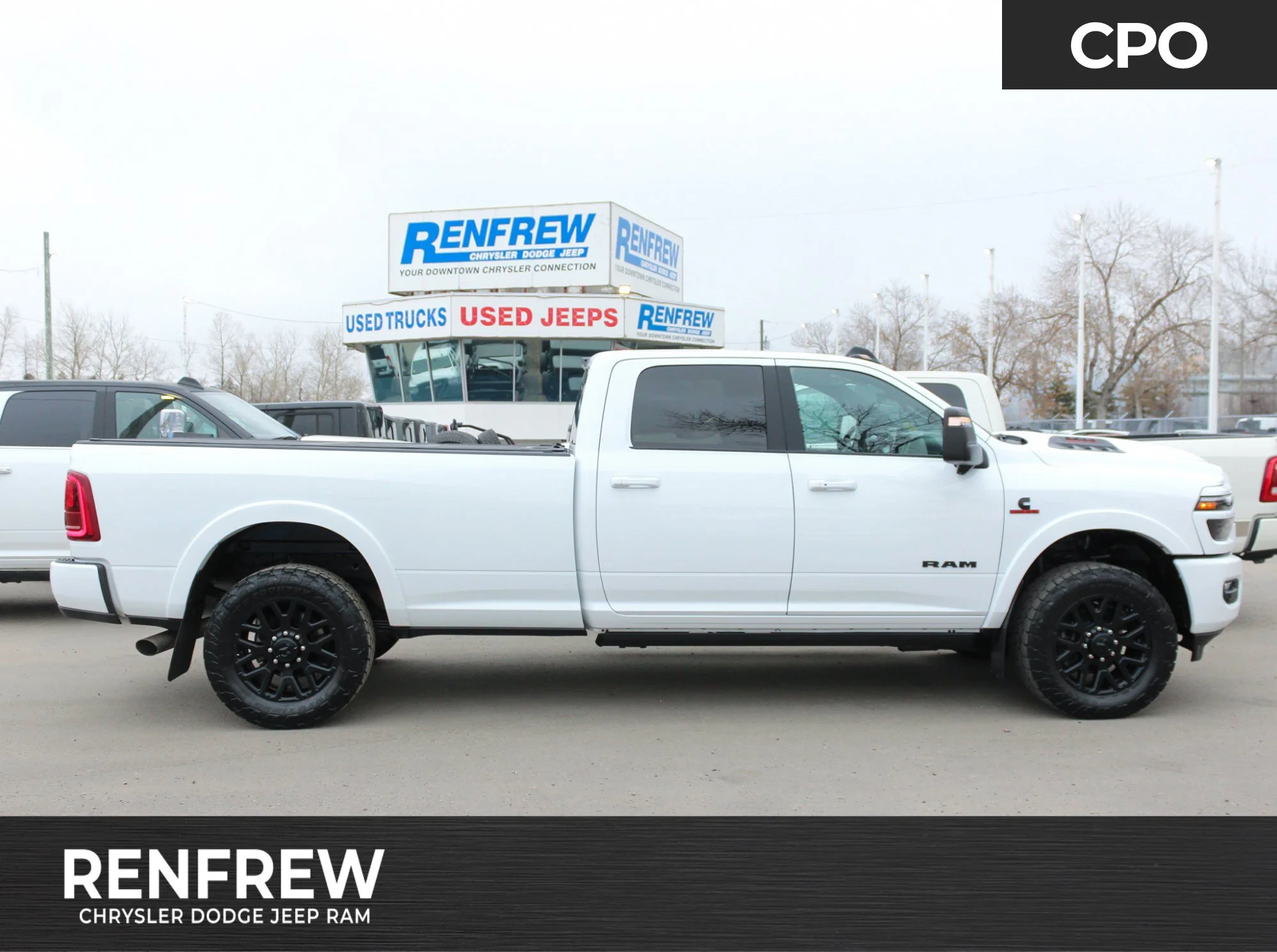 Certified Used 2025 White RAM Limited * Cummins Diesel | 5th Wheel & Gooseneck | Adaptive Cruise | Apple CarPlay | Tonneau Cover image 1