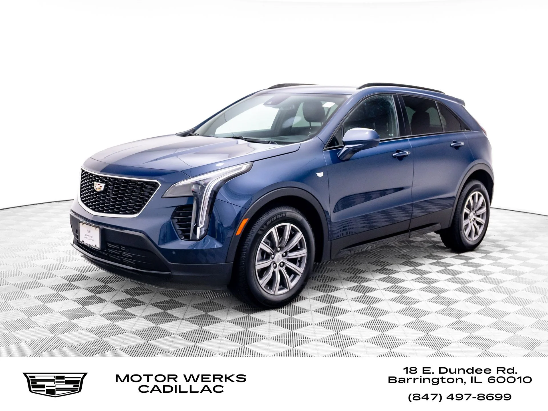 Used 2020 Blue Cadillac Sport image 1
