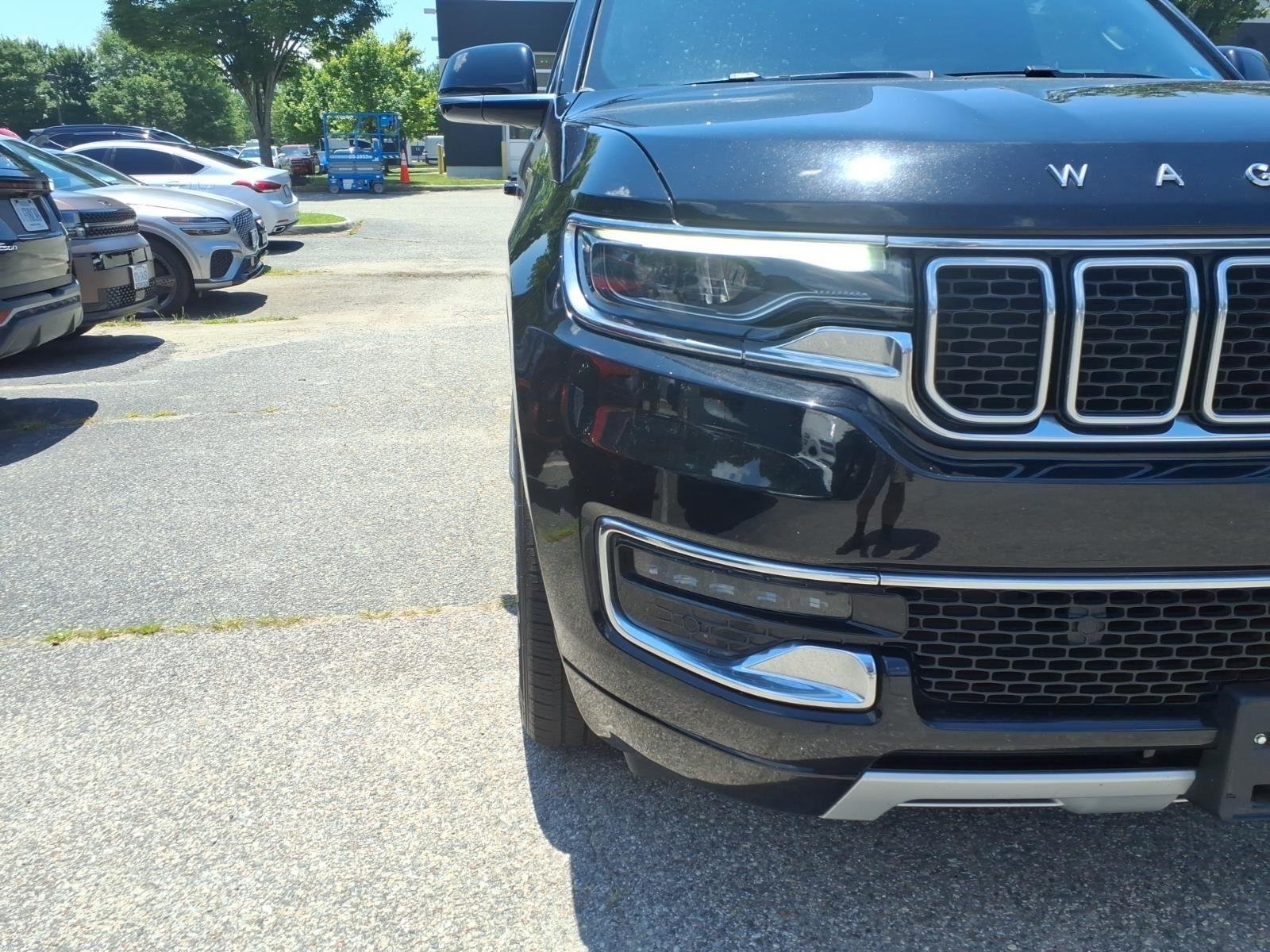 Used 2024 Diamond Black Crystal Pearlcoat Jeep Series II image 3