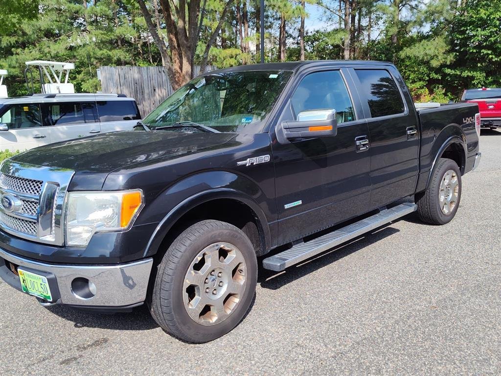 Used 2012 Tuxedo Black Metallic Ford Lariat image 1