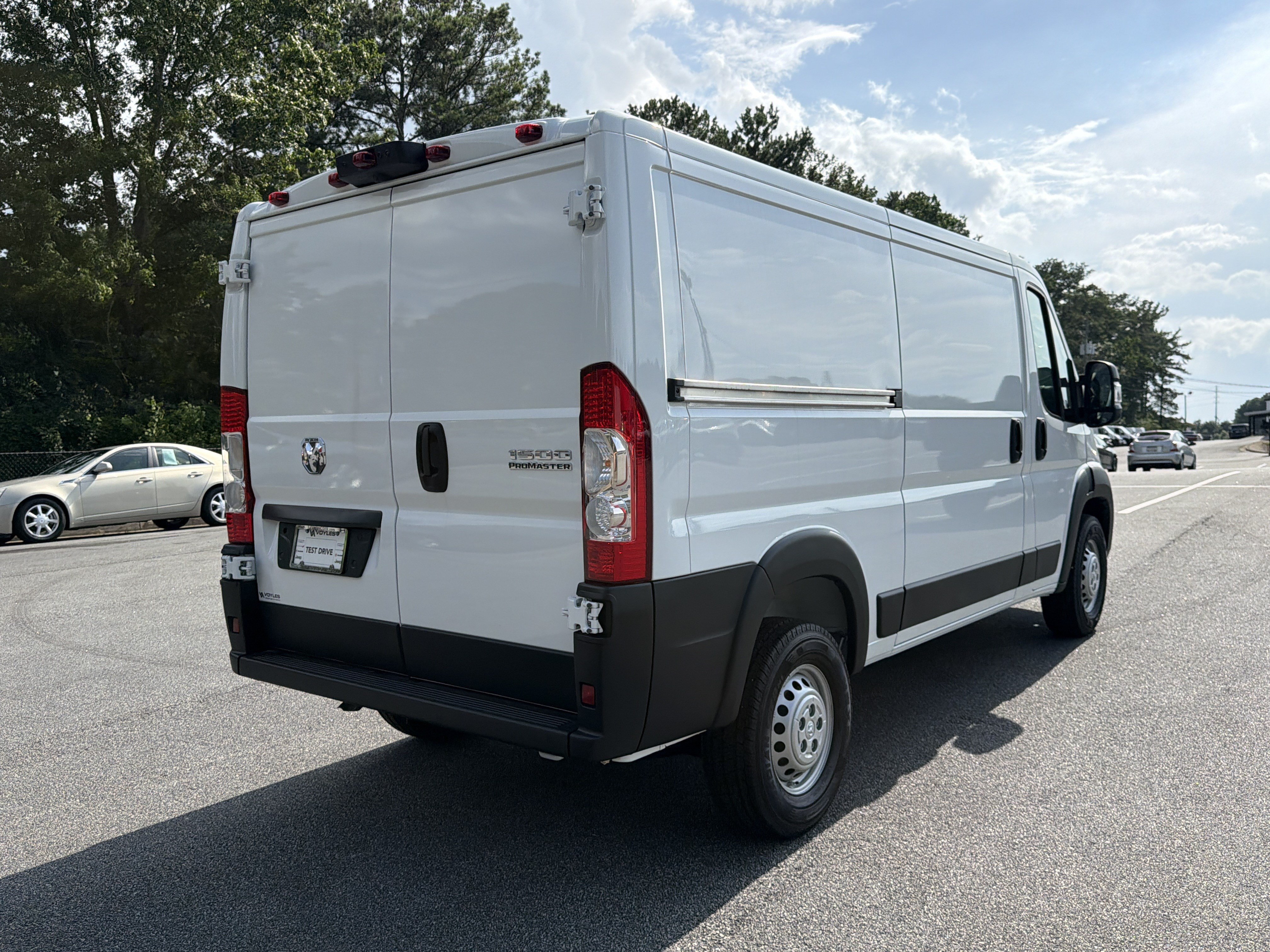 New 2026 Bright White Clearcoat RAM Low Roof image 8
