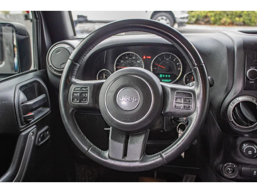 Used 2018 Granite Crystal Metallic Clearcoat Jeep Sport S image 33