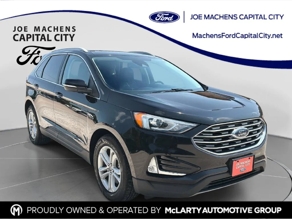Used 2020 Black Ford SEL image 1