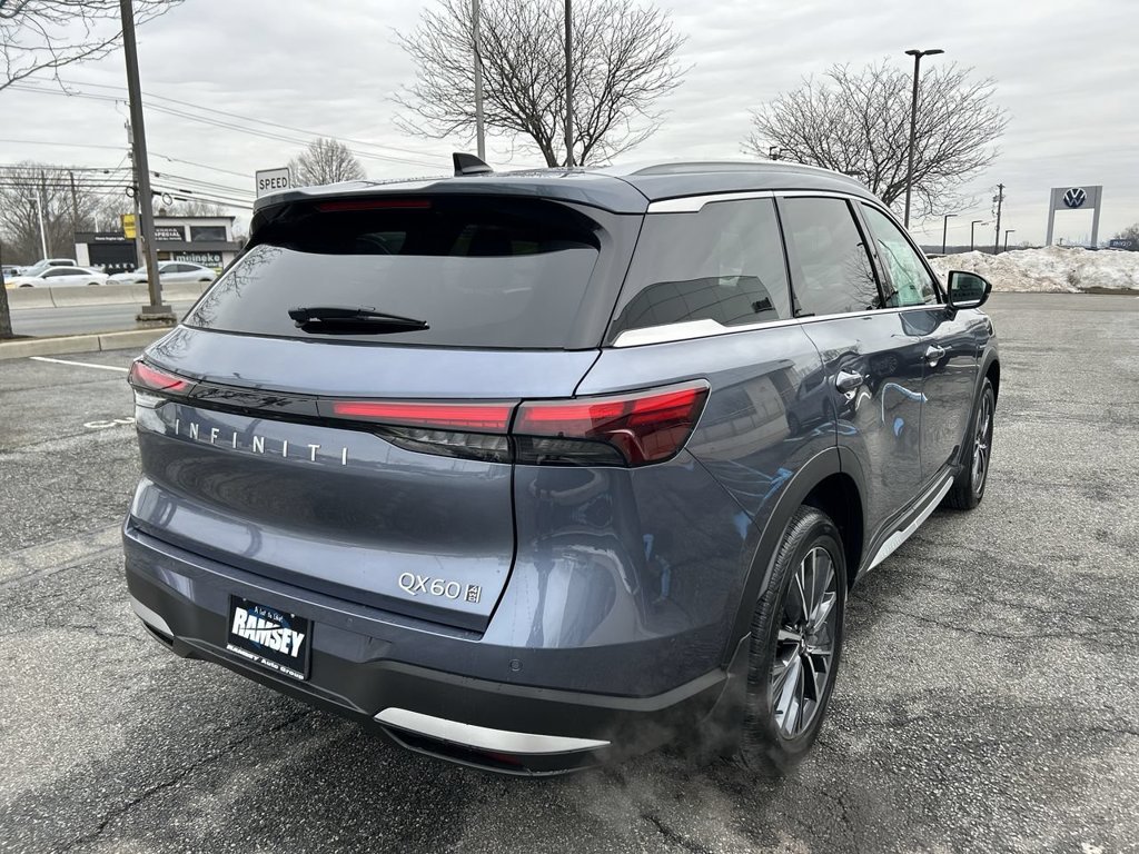 Certified Used 2026 Blue INFINITI LUXE image 8