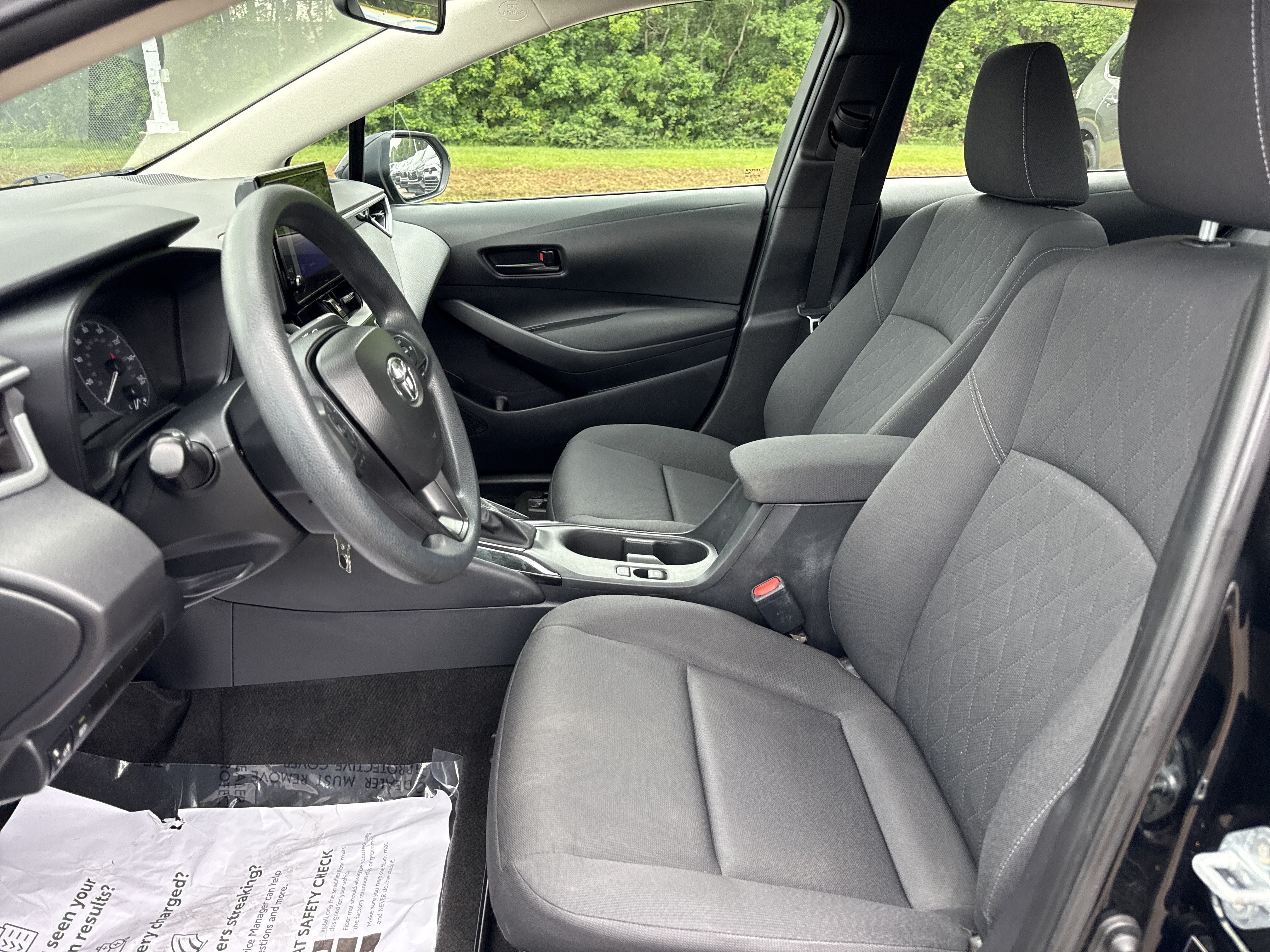 Used 2024 Midnight Black Metallic Toyota LE image 11