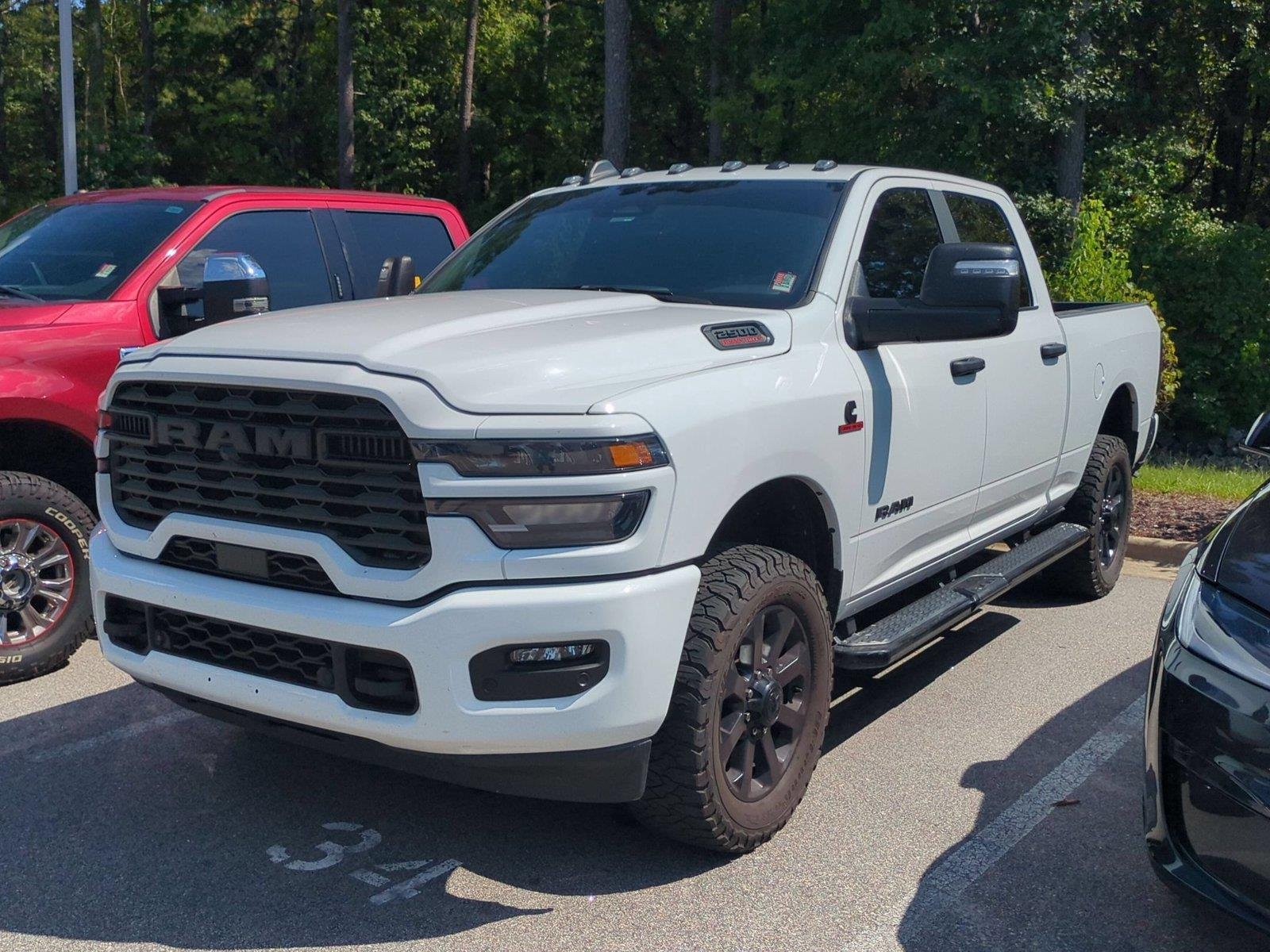 Used 2025 Bright White Clearcoat Ram Big Horn image 1