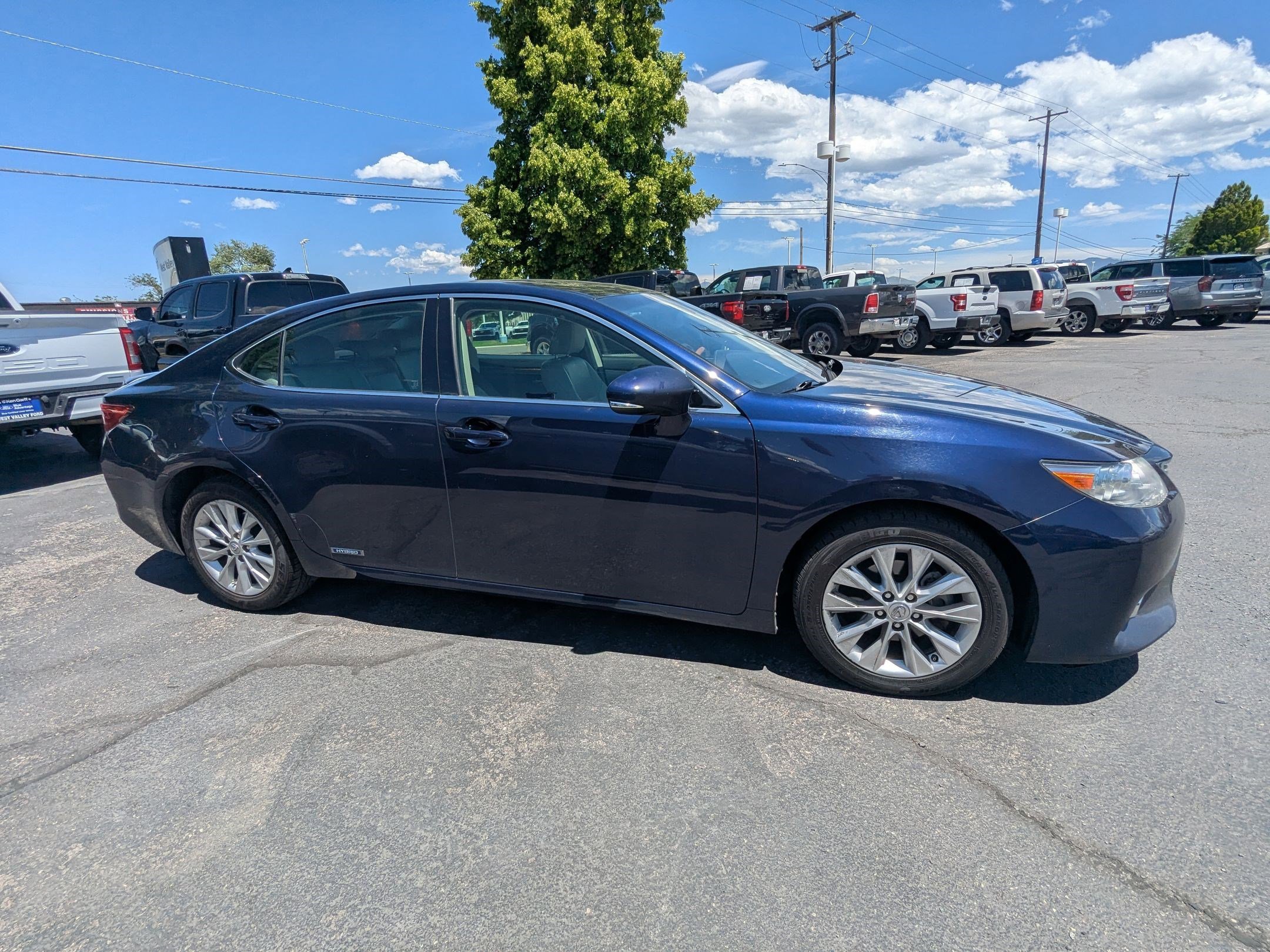 Used 2015 Lexus ES 300h with VIN JTHBW1GG4F2093374 for sale in West Valley City, UT