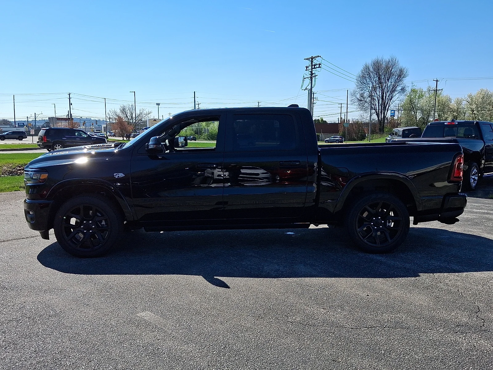 New 2026 Diamond Black Crystal Pearl-Coat Exterior Paint RAM Laramie image 5