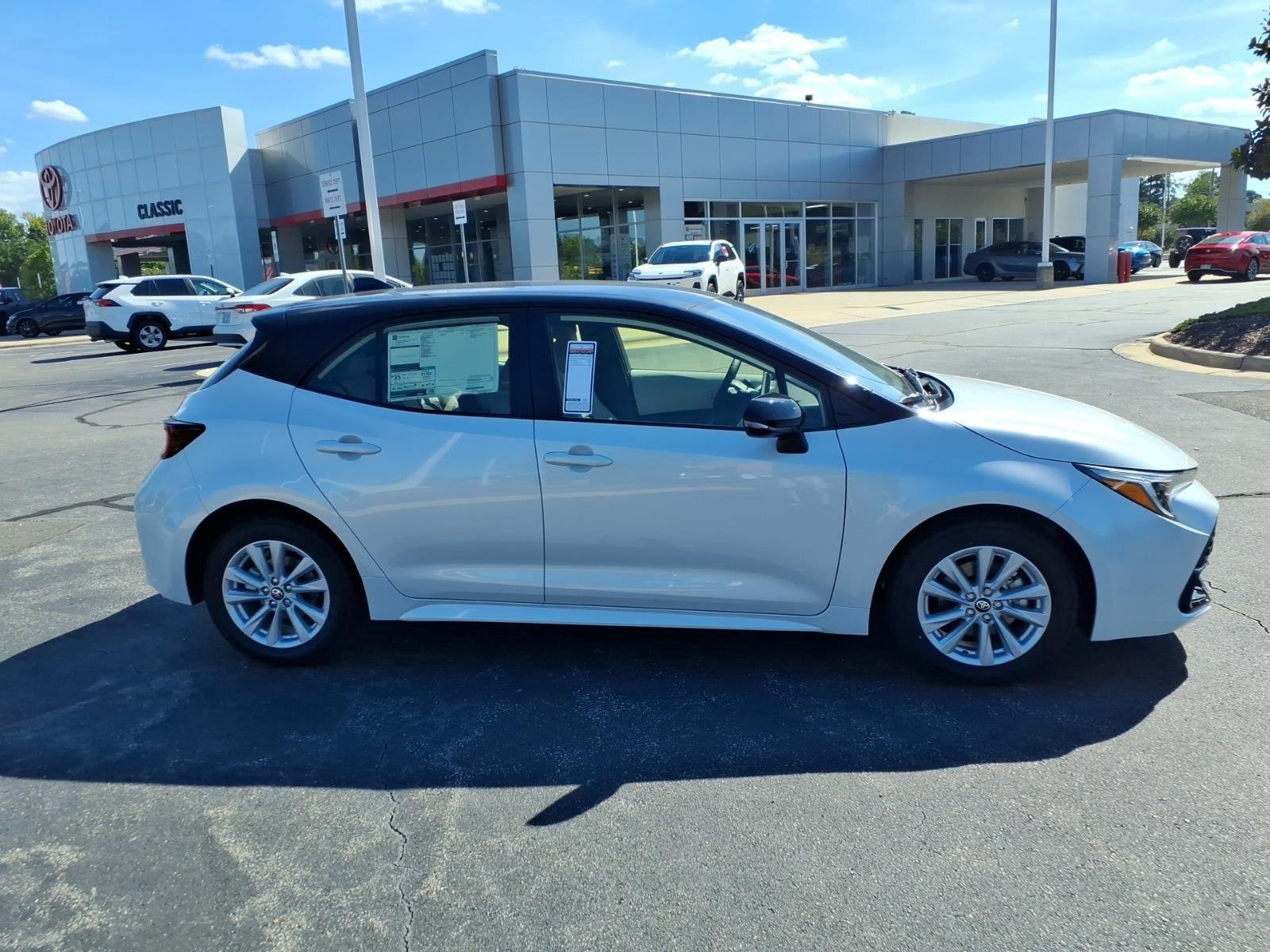 New 2027 Wind Chill Pearl with Black roof Toyota SE image 9
