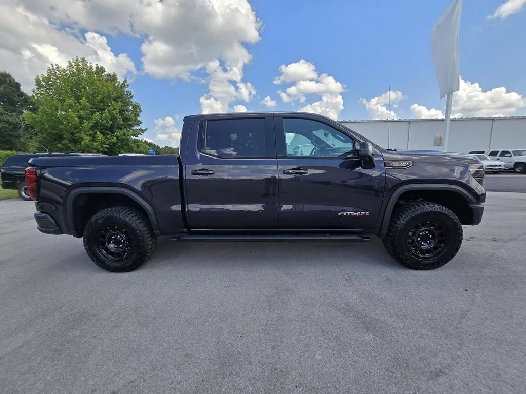 Used 2023 Titanium Rush Metallic GMC AT4X image 8