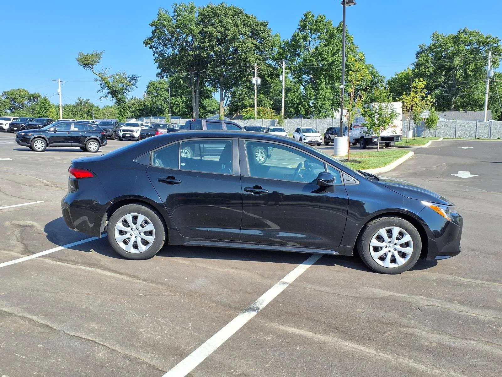Certified Used 2024 Midnight Black Metallic Toyota LE image 2