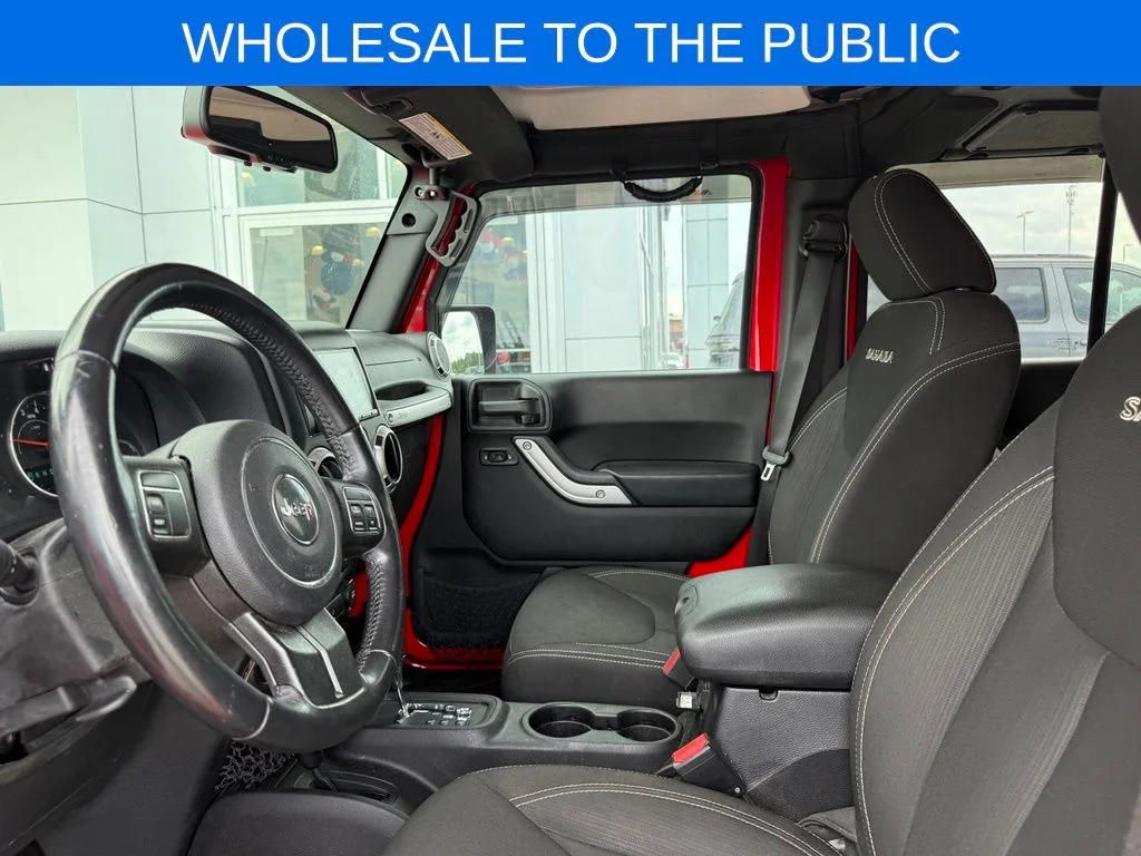 Used 2016 Red Jeep Unlimited Sahara image 4