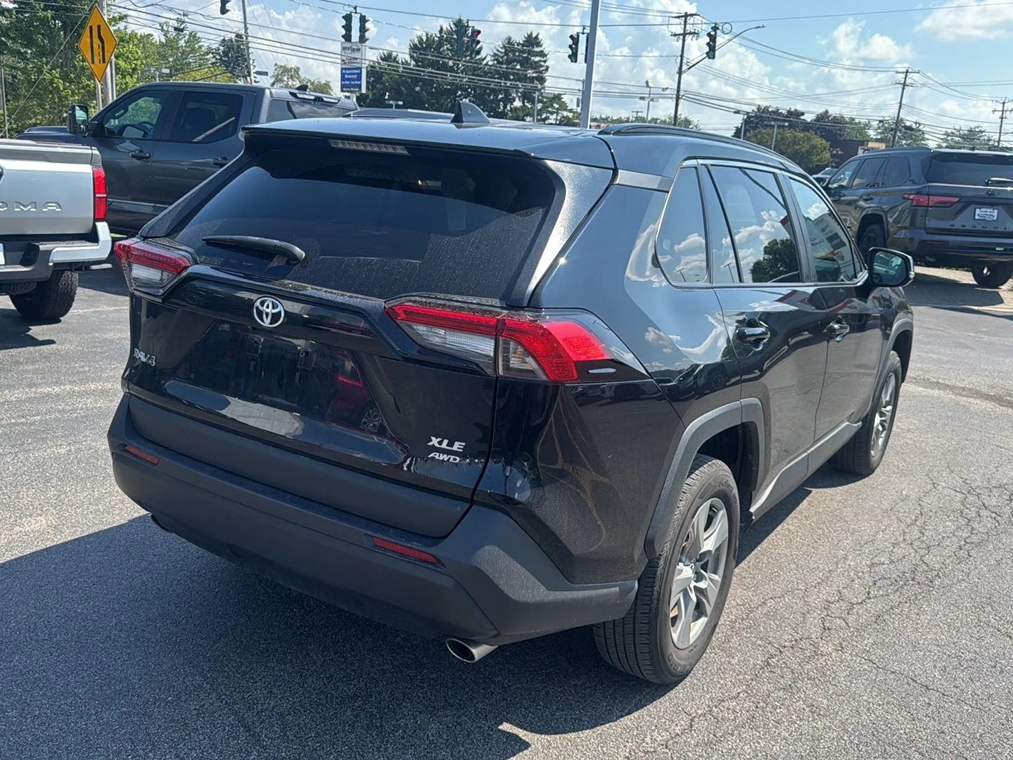Used 2024 Midnight Black Metallic Toyota XLE image 6