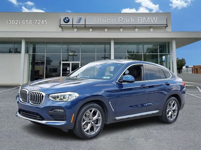 Used 2020 Phytonic Blue Metallic BMW xDrive30i image 1