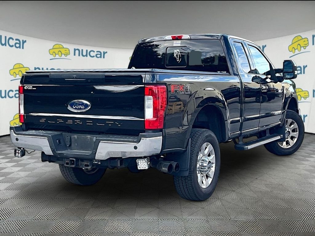 Used 2019 Black Metallic Ford Lariat image 6