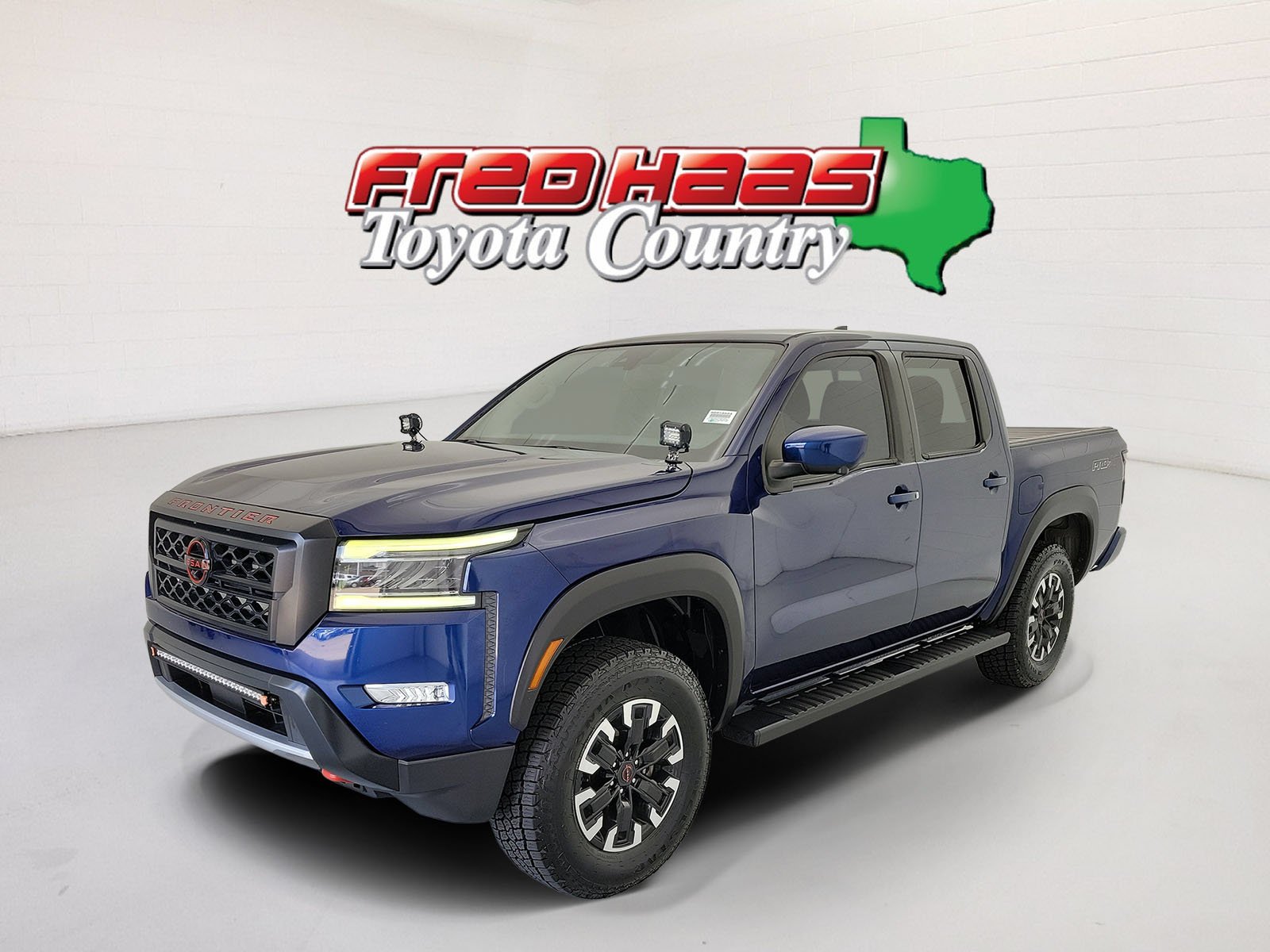Used 2022 Deep Blue Pearl Nissan PRO-X image 1