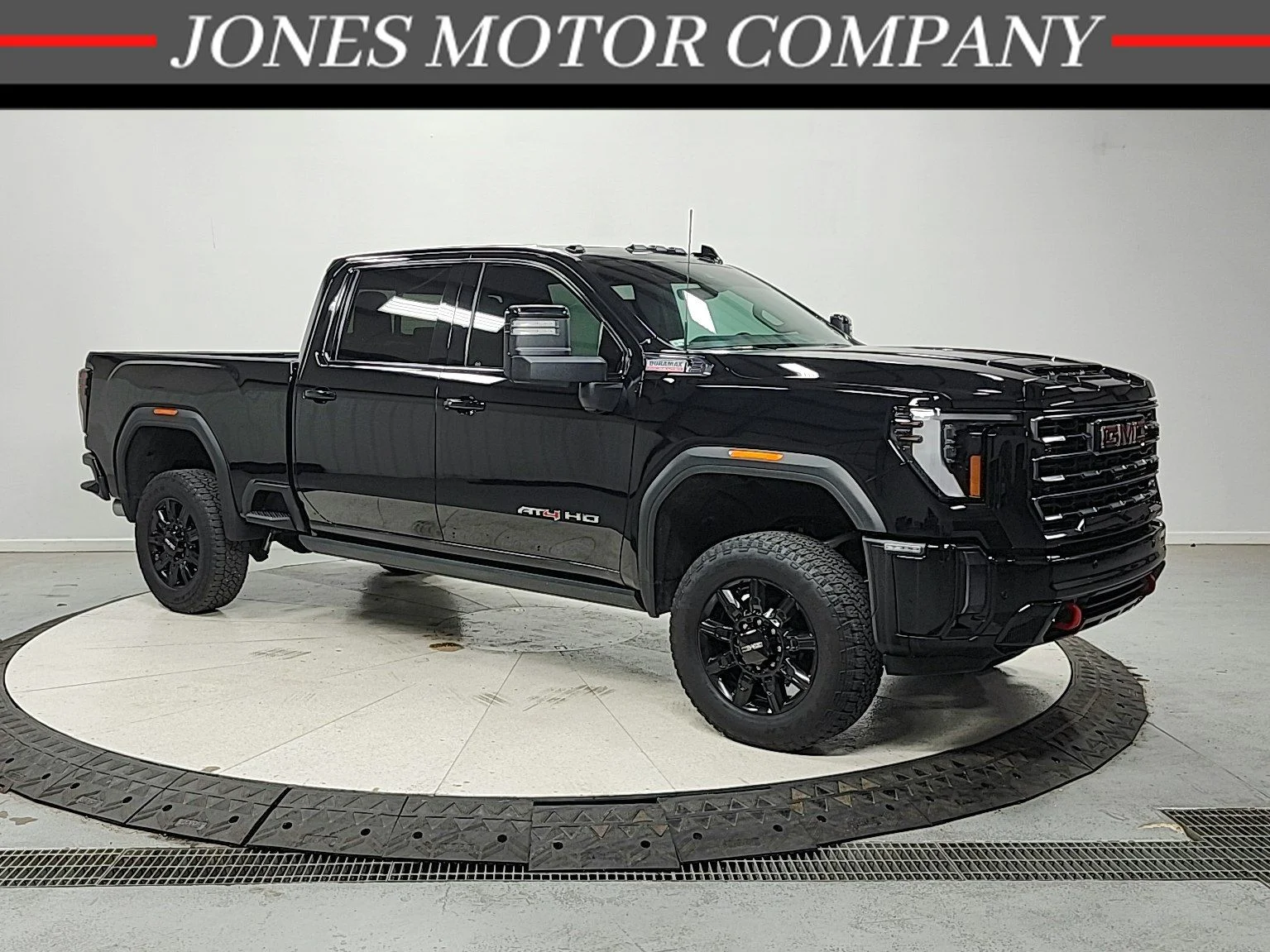 Used 2024 Black GMC AT4 image 1