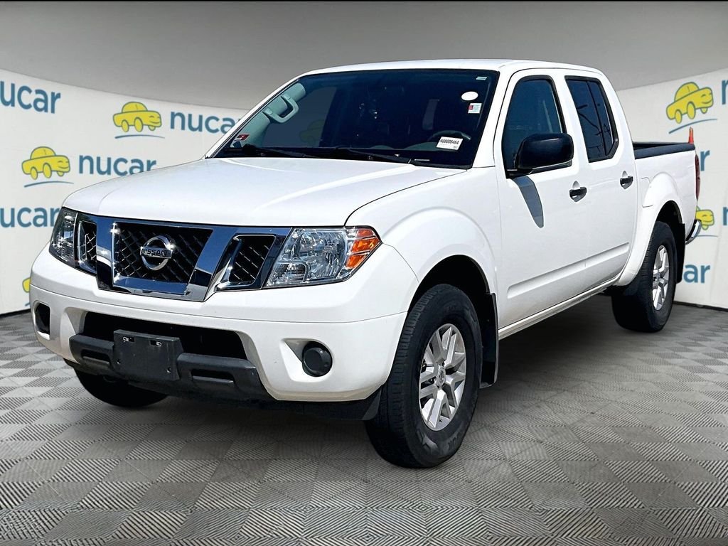 Used 2019 White Nissan SV image 1