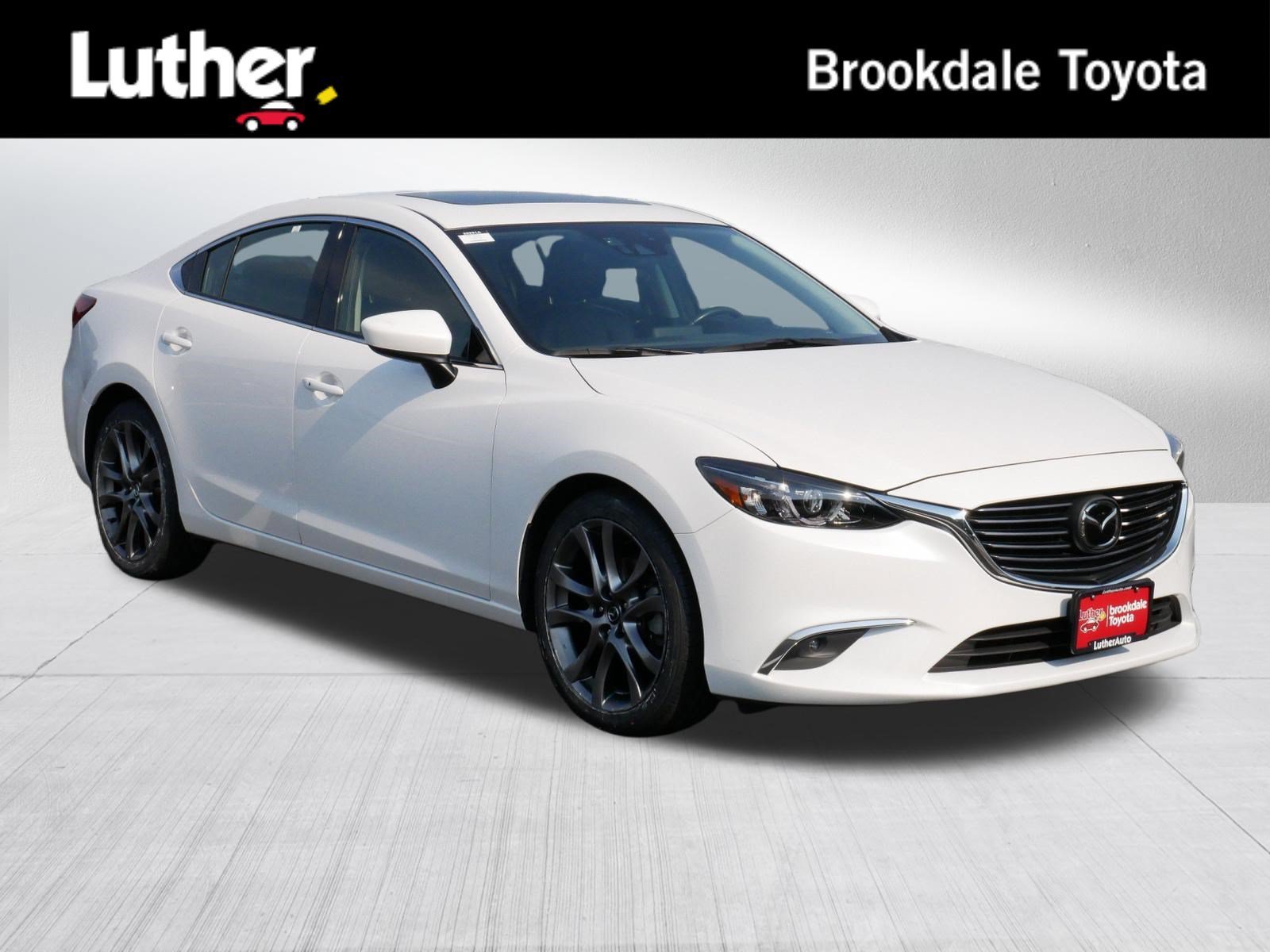 Used 2016 Snowflake White Pearl Mica Mazda i Grand Touring image 1