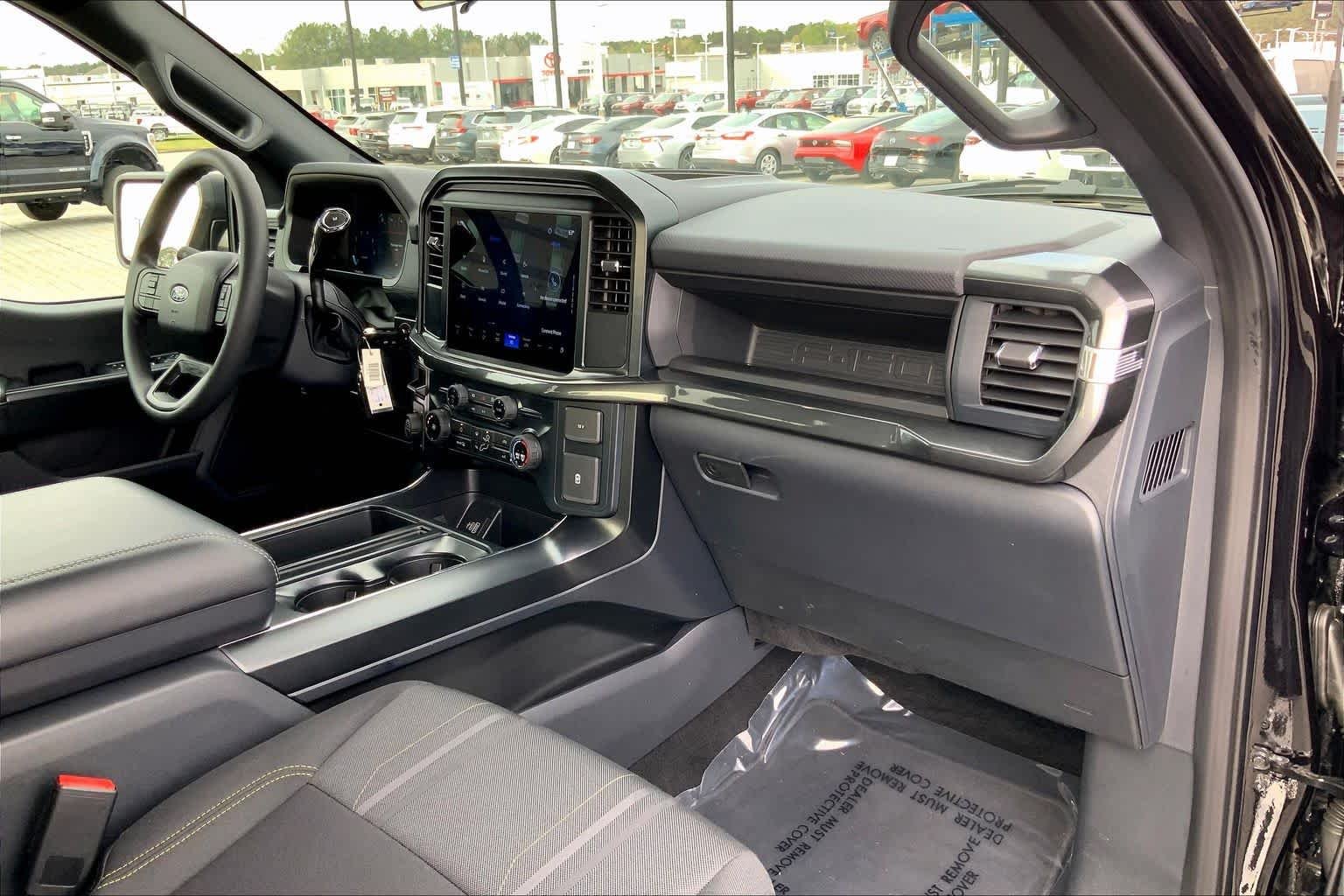Used 2025 Agate Black Metallic Ford STX image 28