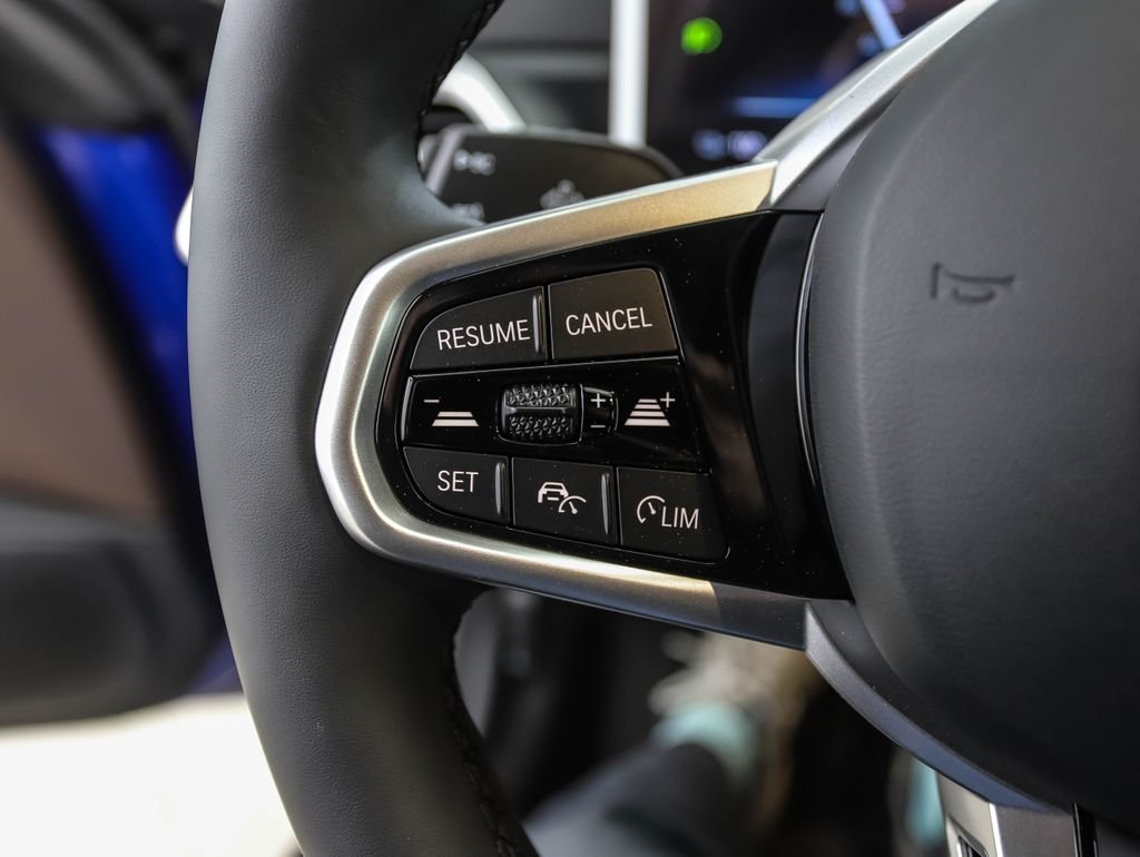 Used 2026 Blue Metallic BMW xDrive40 image 12