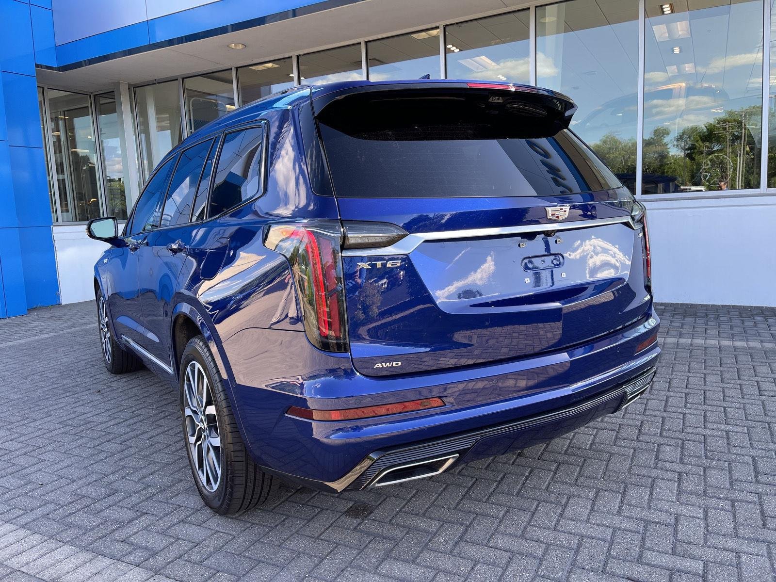 Used 2024 Opulent Blue Metallic Cadillac Sport image 3