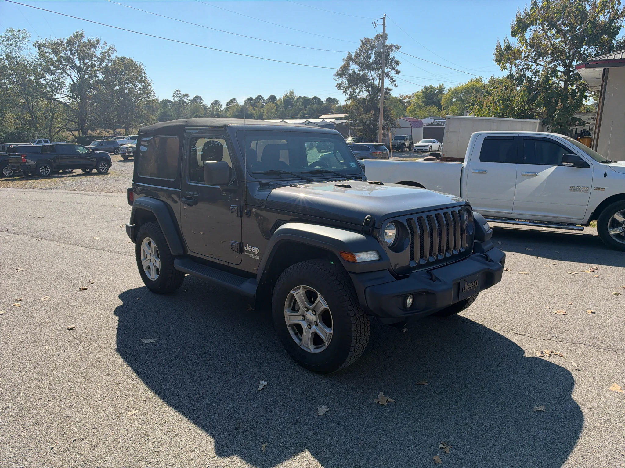 Used 2020 Granite Crystal Metallic Clearcoat Jeep Sport S image 1