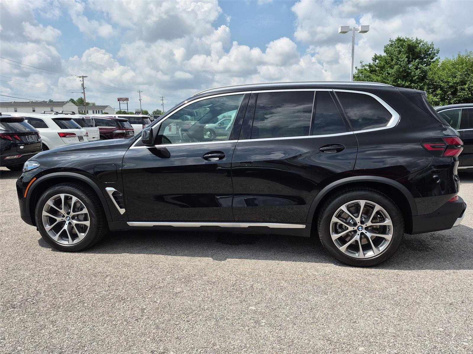 New 2026 Black Sapphire Metallic BMW xDrive50e image 2