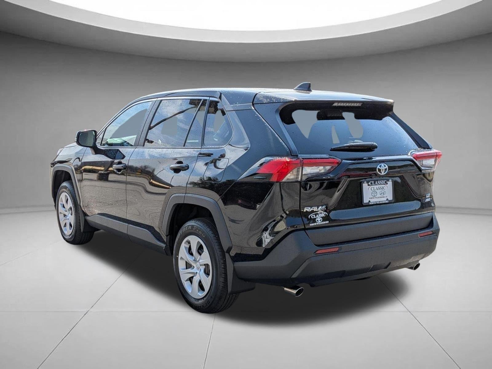 Used 2025 Midnight Black Metallic Toyota LE image 7