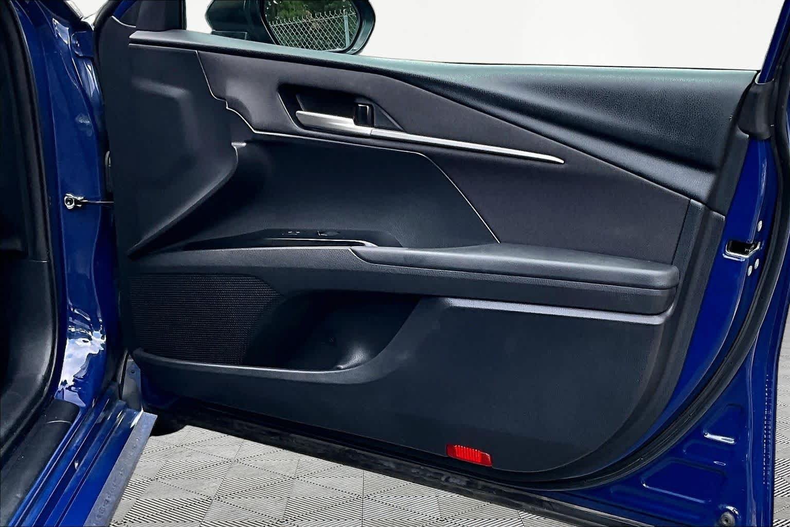 Used 2025 Reservoir Blue Toyota LE image 23