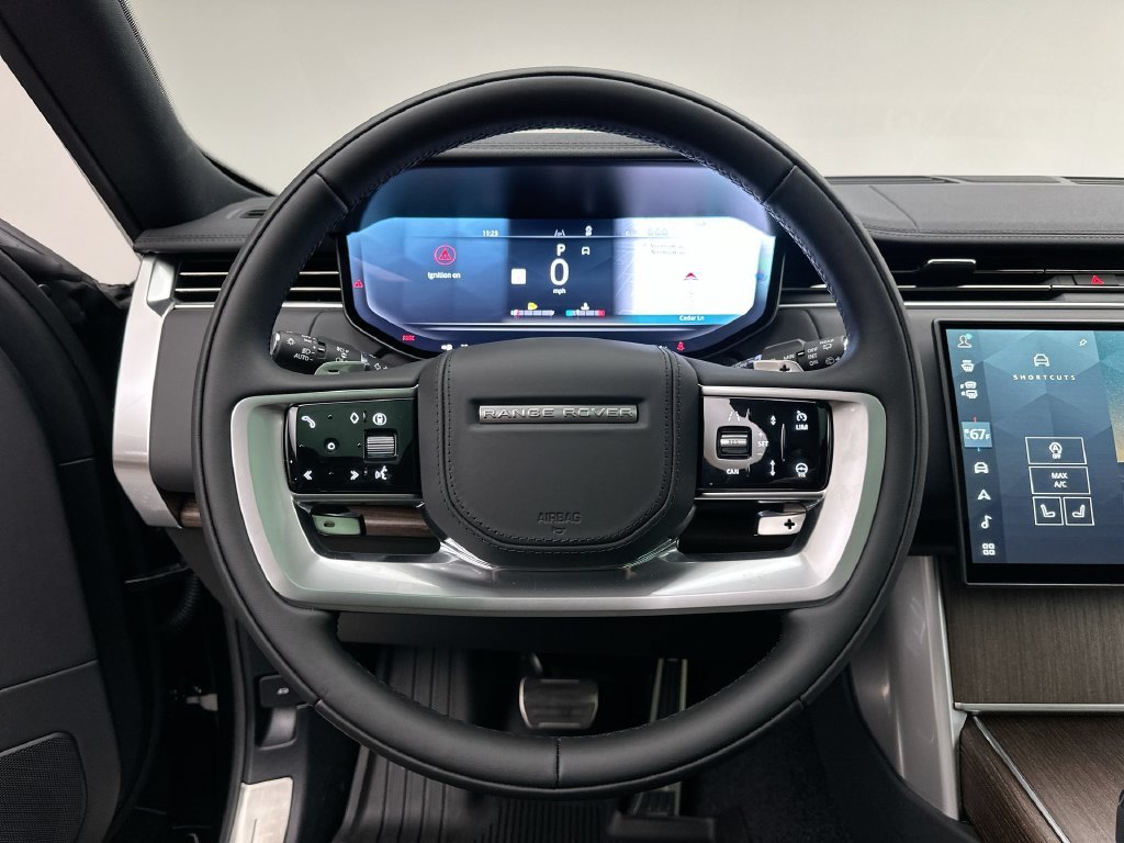 New 2027 Santorini Black Metallic Land Rover SE image 14