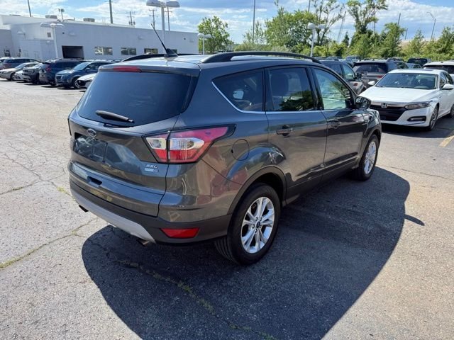 Used 2018 Magnetic Metallic Ford SEL image 3