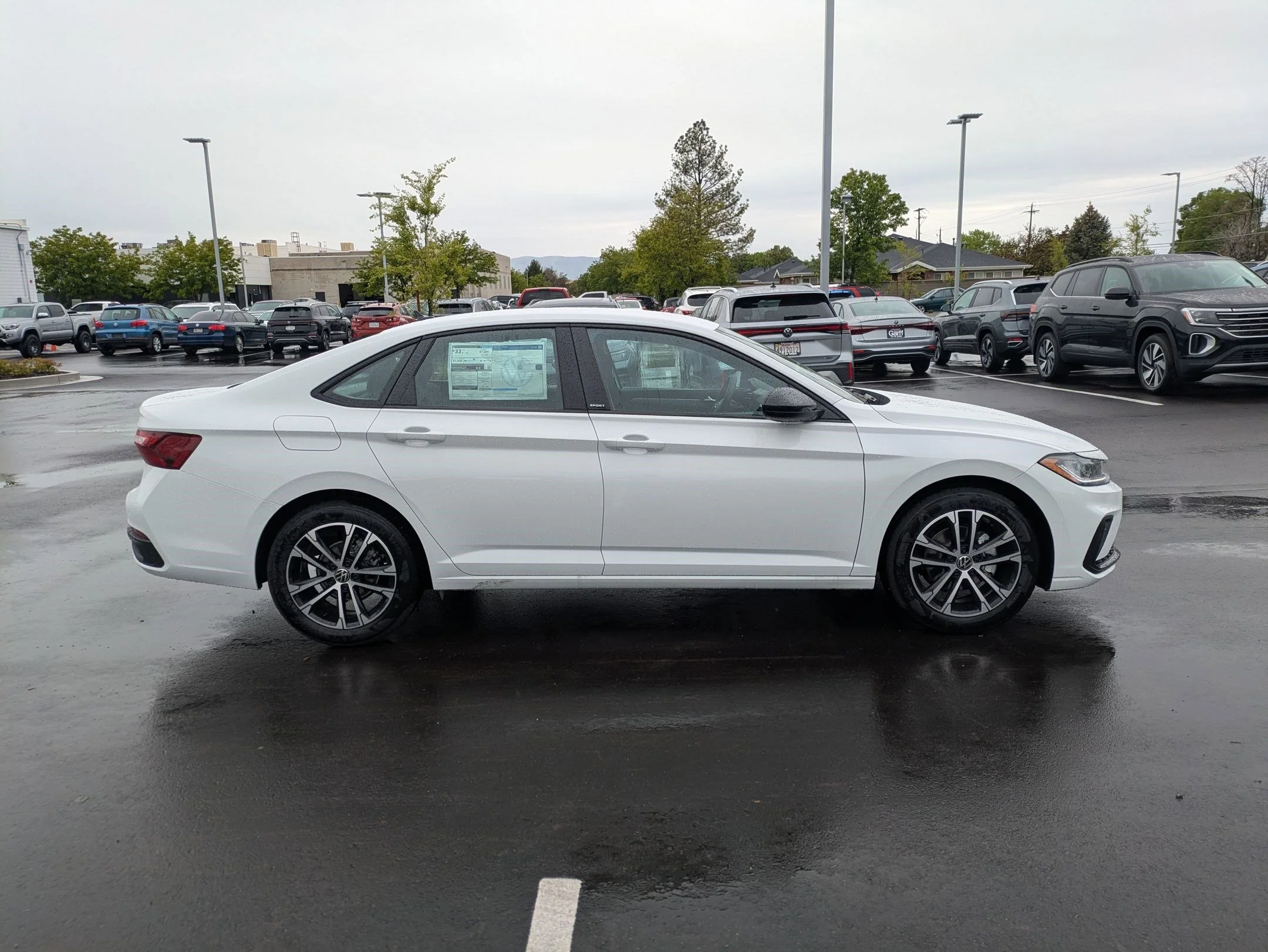 New 2026 Pure White Volkswagen Sport image 2