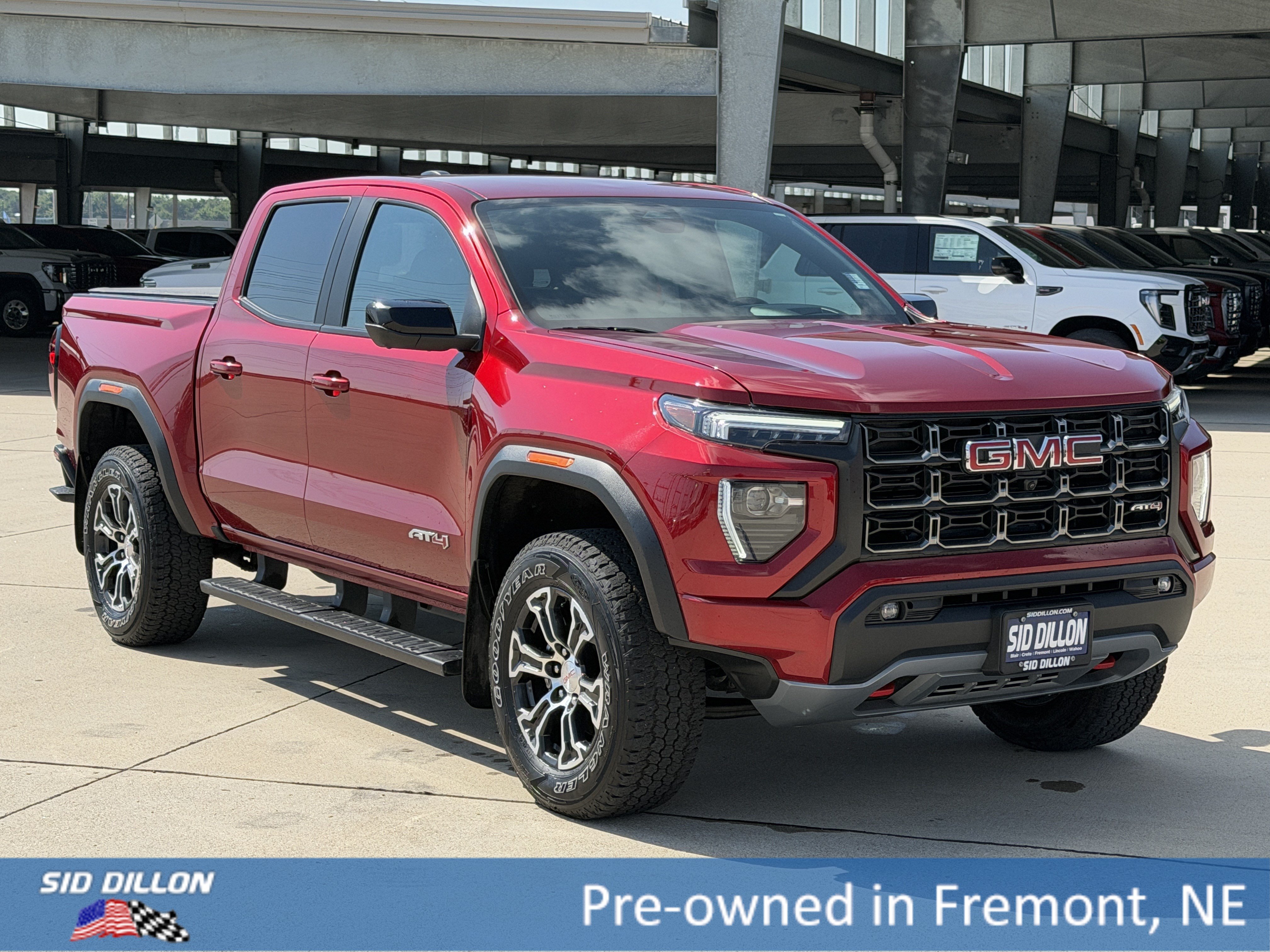 Used 2024 Volcanic Red Tintcoat GMC 4WD AT4 image 2