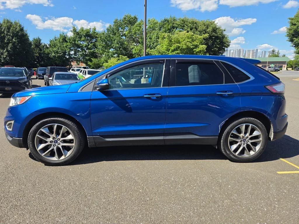 Used 2017 Blue Ford Titanium image 4