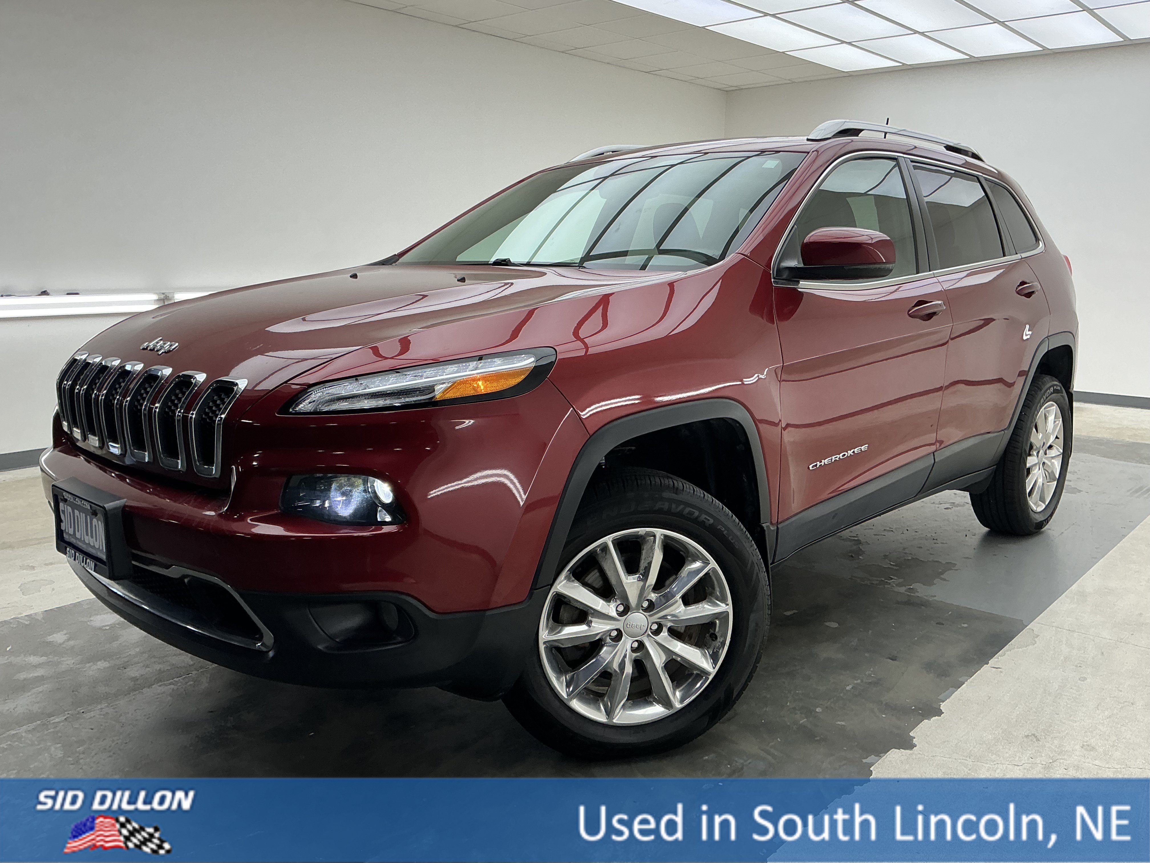 Used 2017 Deep Cherry Red Crystal Pearlcoat Jeep Limited image 1
