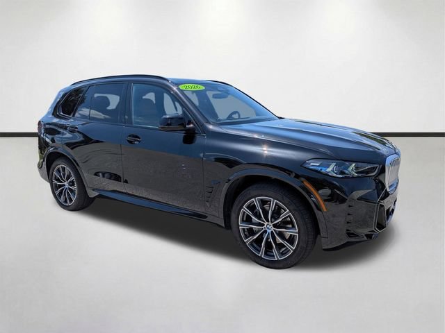 Used 2026 Black Sapphire Metallic BMW sDrive40i image 1
