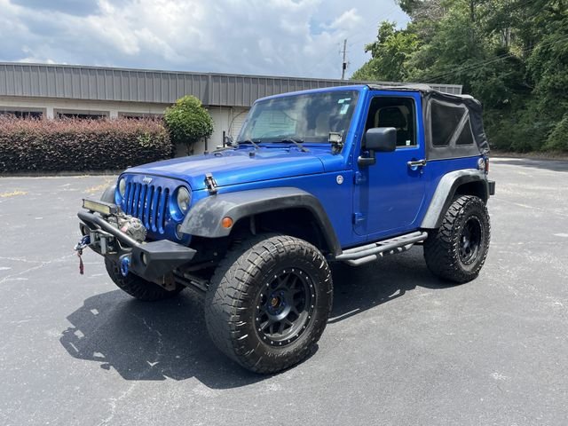 Used 2014 Flame Red Clearcoat Jeep Sport image 3