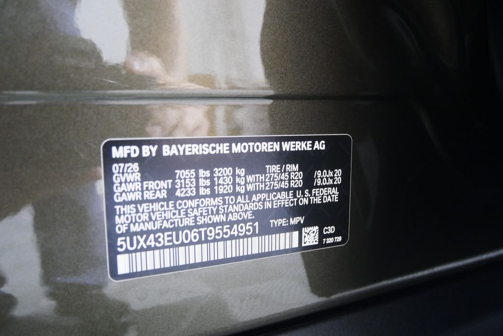 New 2026 Manhattan Green Metallic BMW xDrive50e image 23