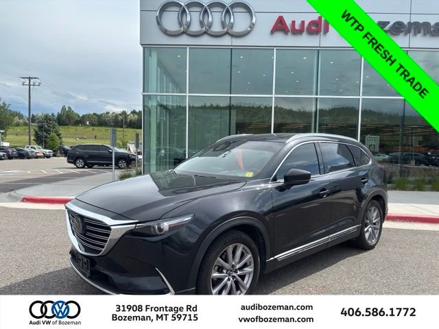 Used 2020 Black Mazda Grand Touring image 1
