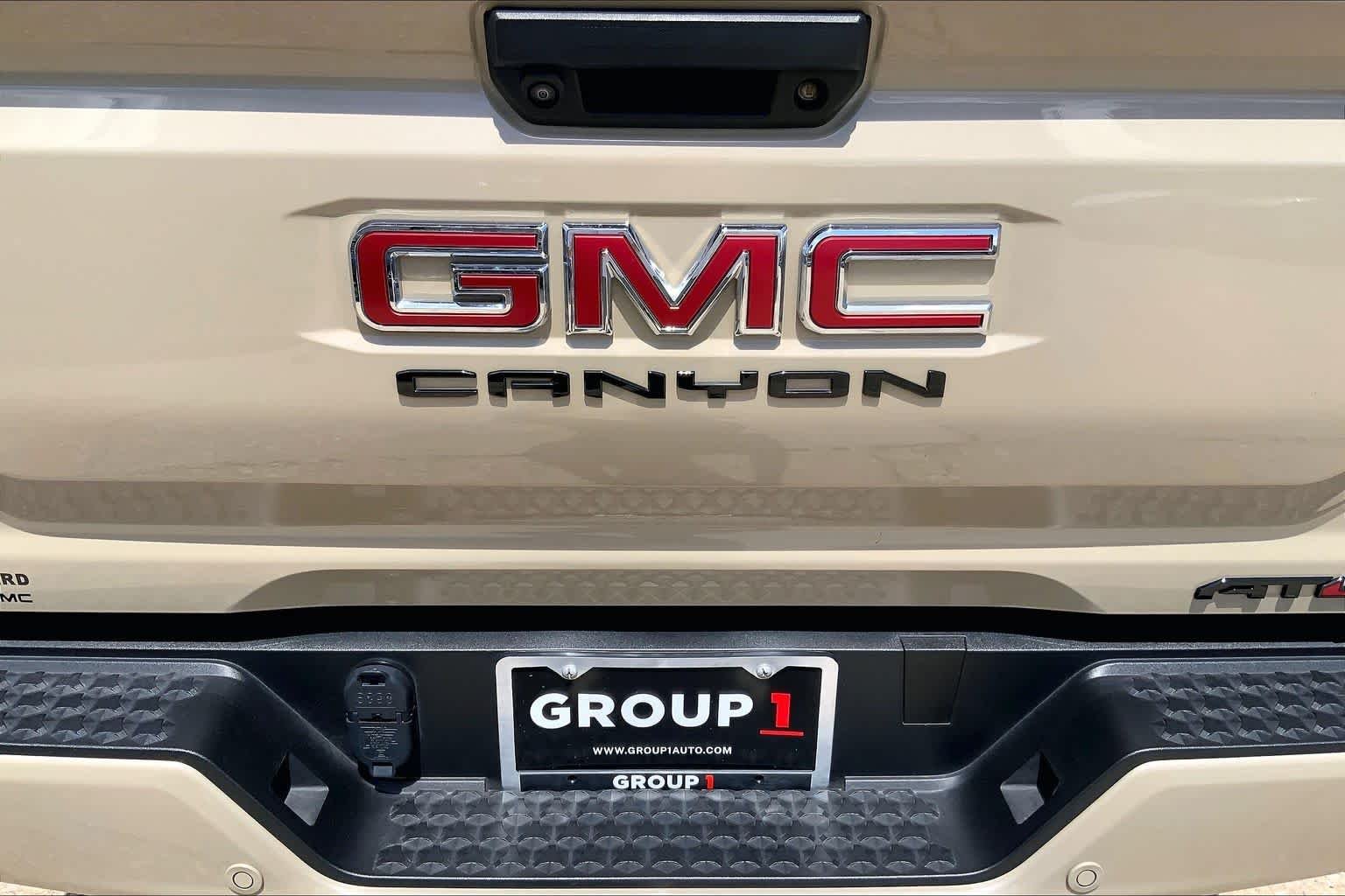 Used 2024 Desert Sand Metallic GMC 4WD AT4 image 30