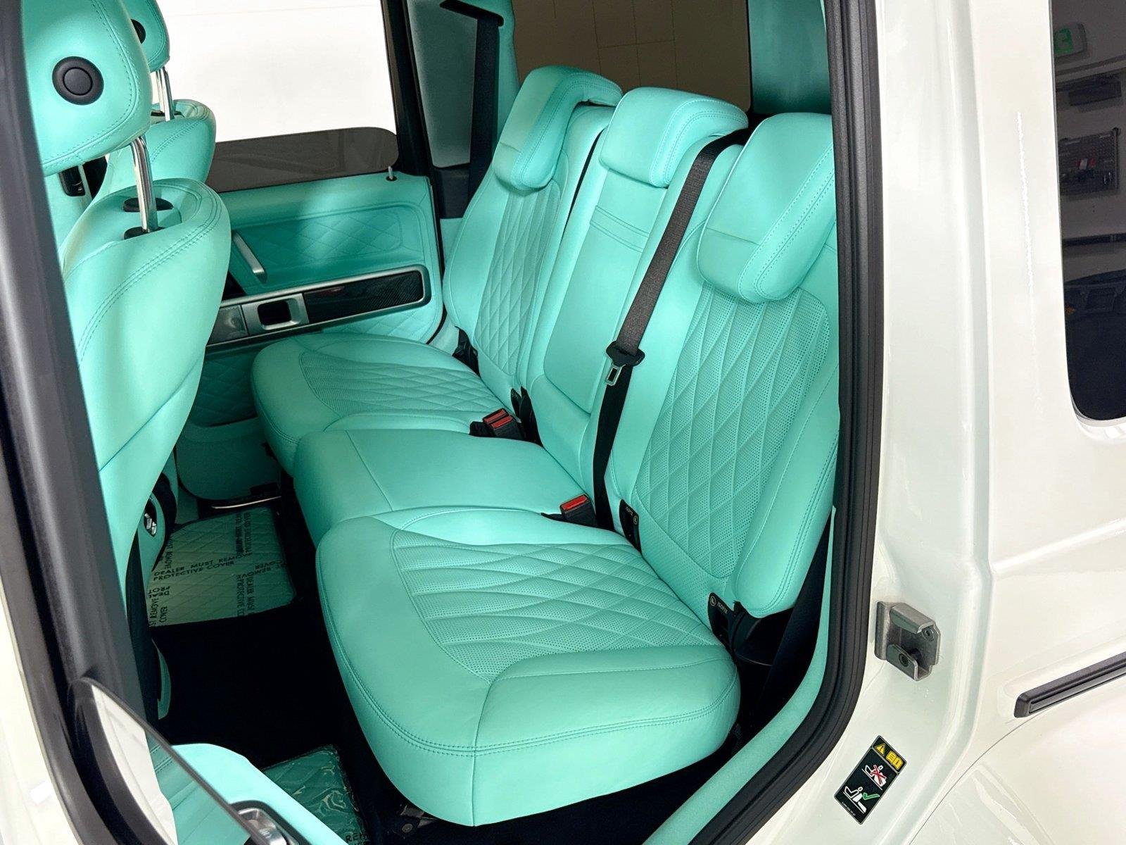 Used 2024 Polar White Mercedes-Benz AMG® G 63  Brabus Custom Widebody / Custom Tiffany Interior image 22