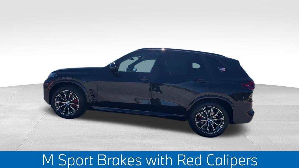 New 2026 Black Sapphire Metallic BMW xDrive40i image 8